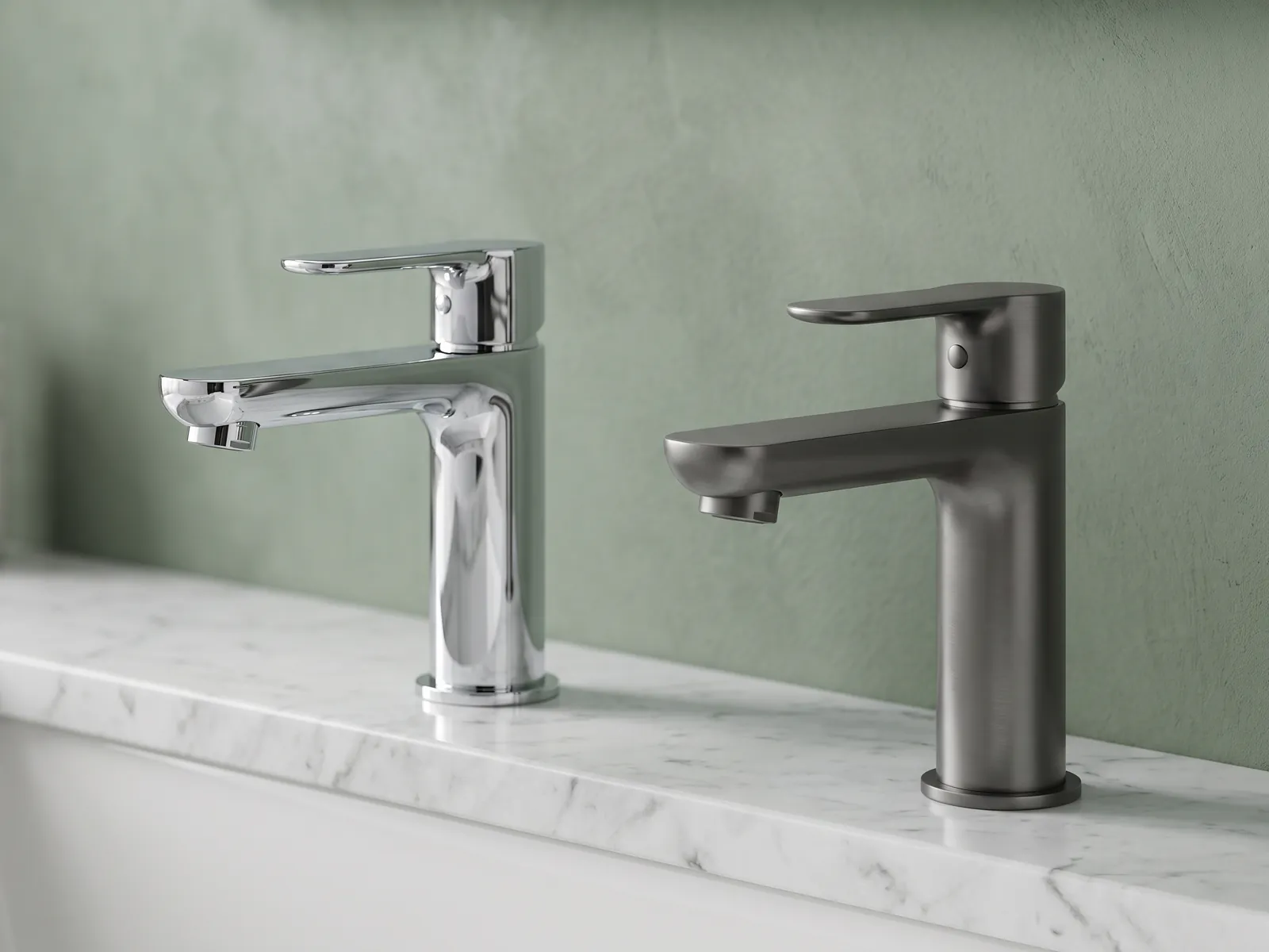 Two basin mixers in chrome and brushed graphite compared on marble