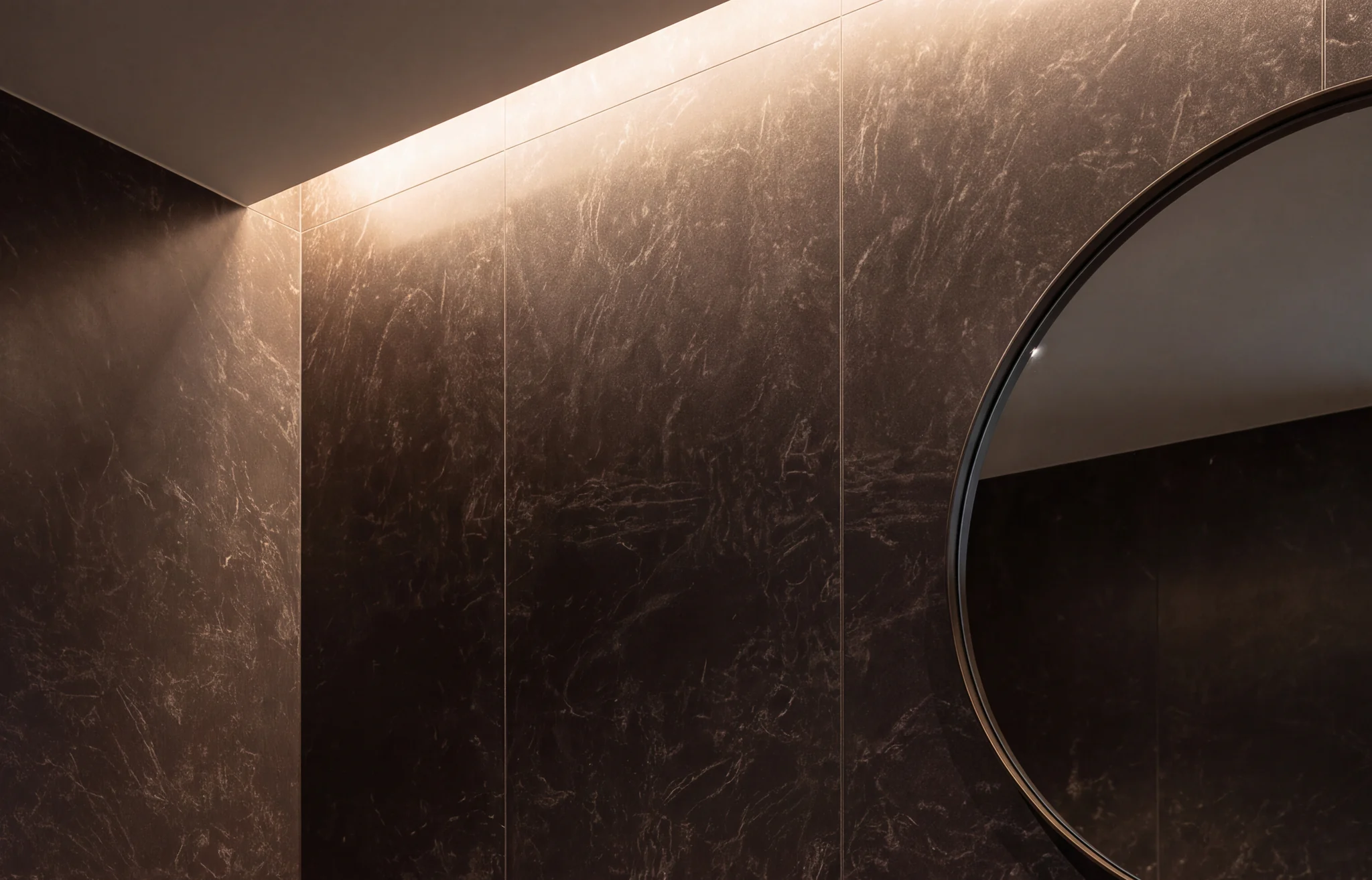 Emperador Scuro engineered marble vanity wall in a warm bathroom